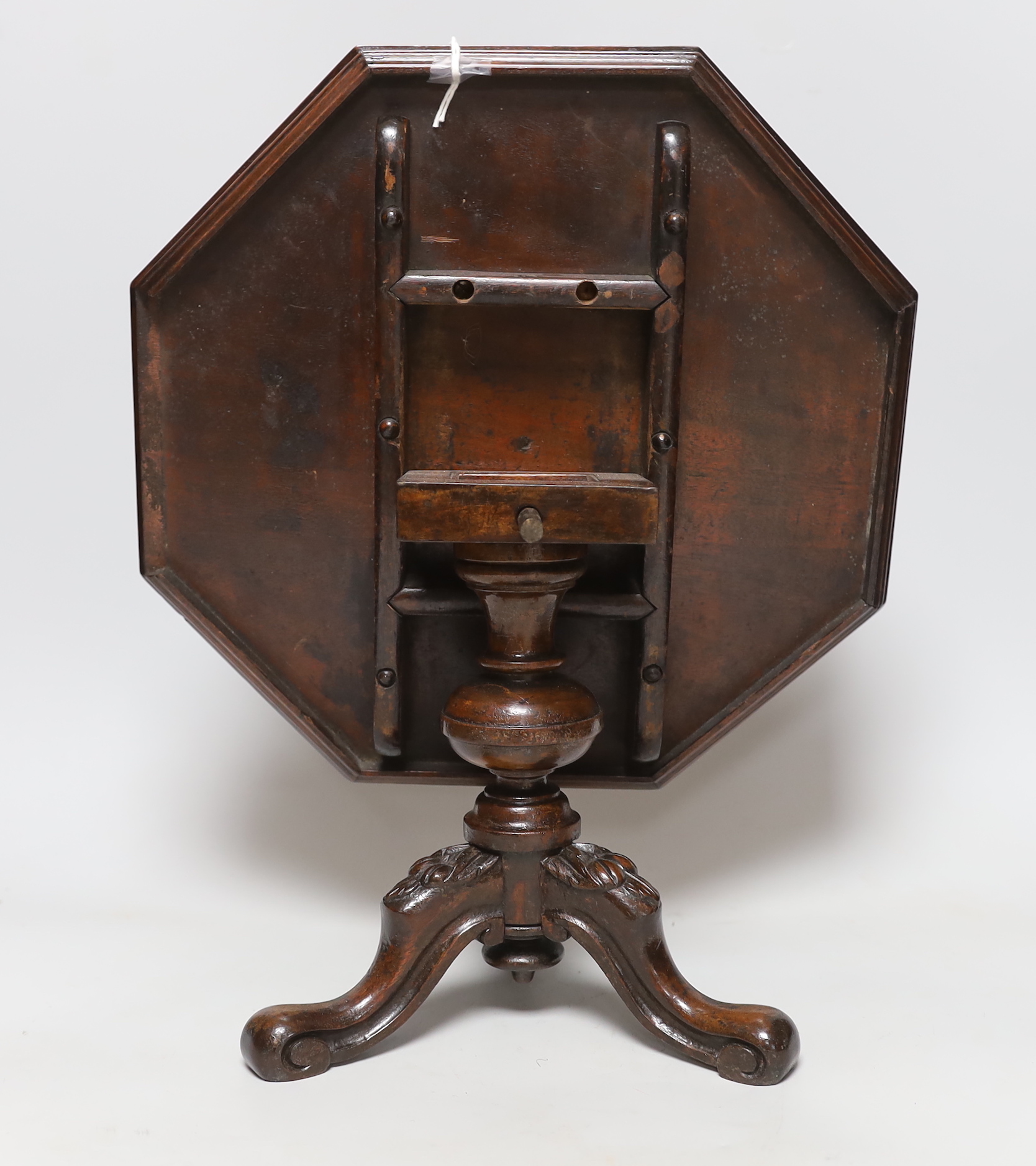 An octagonal topped burr walnut miniature tripod table, 32cm across